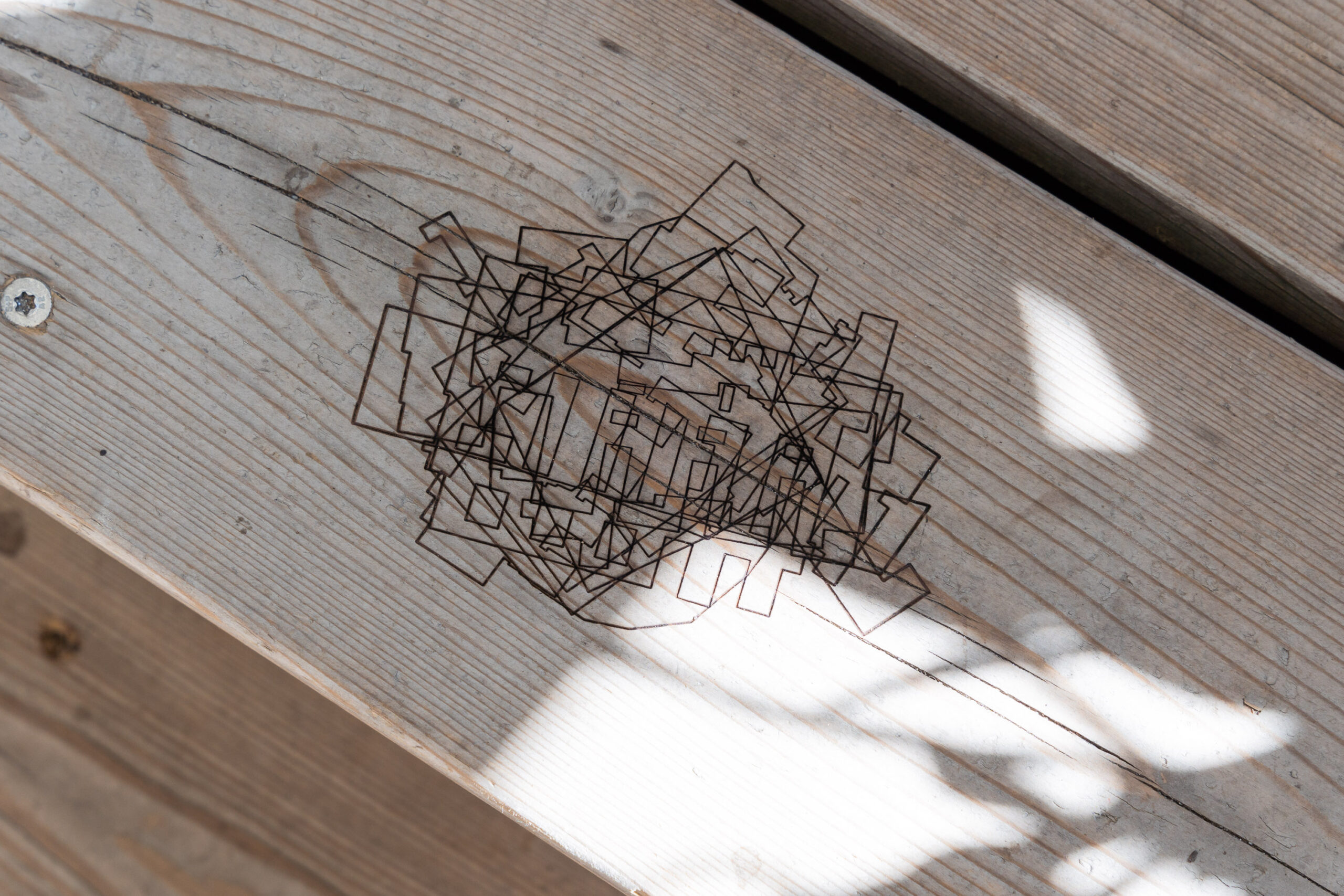 Julian Palacz ‚Little Boxes / Top Ten (The largest schools)‘ engraved on the Klima-Kultur-Pavillon (Breathe Earth Collective) 2024.